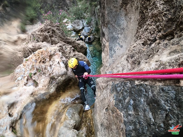 Abseiling or jumping while canyoning in the Rio Verde