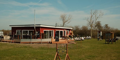 Kite school - Saisonzeiten: Juli - Schleswig-Holstein - Cafe & Bistro - Primesurf Fehmarn - Cafe & Bistro / Kitesurfschule und Wingfoilcenter