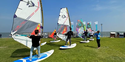 Scuola di aquiloni - Integrierter Kiteshop & Service - Nordseeküste - Windloop Pro Center + Strandbar