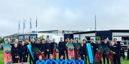 Scuola di aquiloni - Integrierter Kiteshop & Service - Nordseeküste - Windloop Pro Center + Strandbar