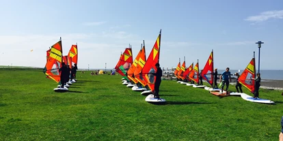 Scuola di aquiloni - Integrierter Kiteshop & Service - Nordseeküste - Windloop Pro Center + Strandbar